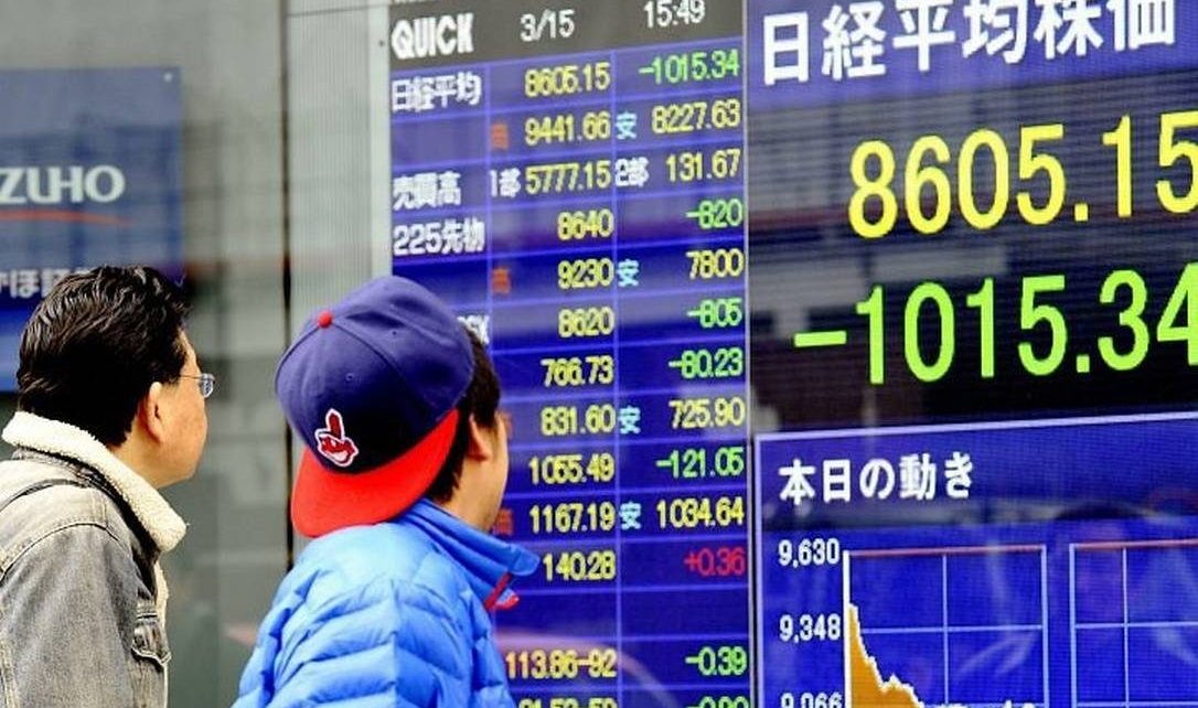 investir em ações no japão comprar bitcoins boleto